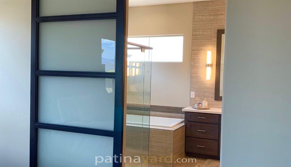 contemporary frosted glass and metal black barn door