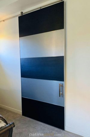 laminate modern barn door with stainless