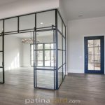 Custom Metal and Glass Wall Enclosure with Barn Doors