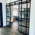 Double Sliding Metal and Glass Doors with Sidelights