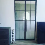 Metal and Sandblasted Glass Hinged Doors