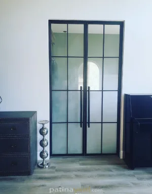 Black metal and sandblasted glass hinged double doors