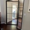 interior metal and glass pivot door