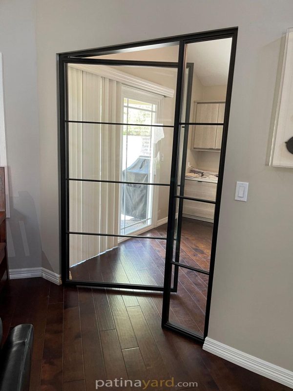 interior metal and glass pivot door