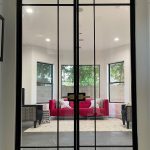 Contemporary Metal and Glass Swinging Doors