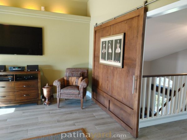 Large loft wood barn door stained