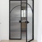 Contemporary Metal and Reeded Glass Doors