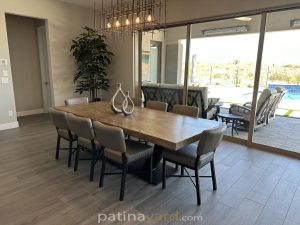 Ash Wood Dining Table with Metal Base Ash wood dining table with a black metal base and gray chairs