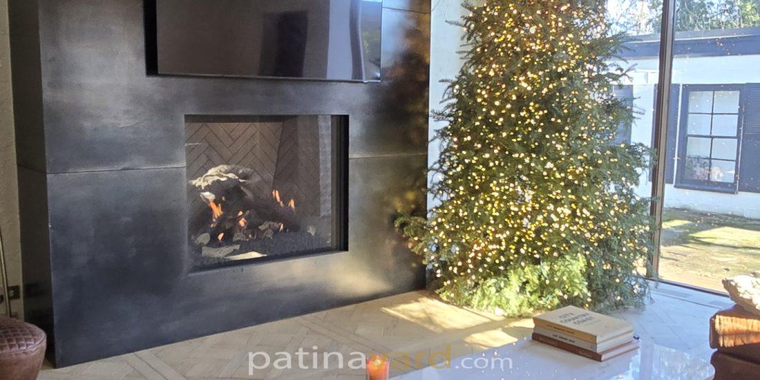 metal fireplace surround with large panels