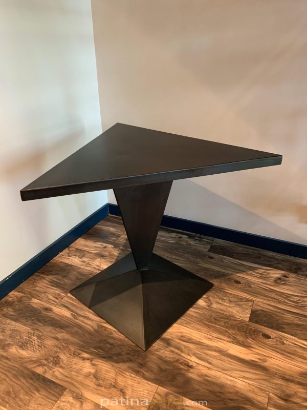Triangle shaped patina steel table on a pyramid base