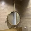 brass custom mirror Bespoke Brass Pivoting and tilting ceiling mounted round mirror