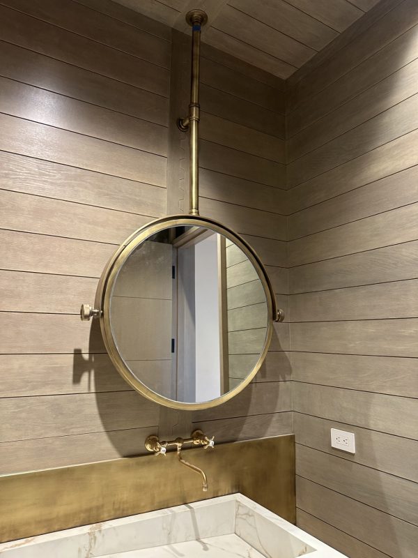 brass custom mirror Bespoke Brass Pivoting and tilting ceiling mounted round mirror