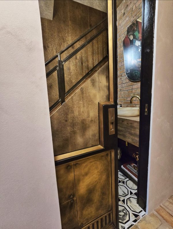 brass-steel_antique_mirrors.009 brass and metal pocket door with antique mirror