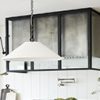Custom Metal and Glass Stove Hood Custom stove hood enclosed in metal and glass