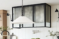 Custom Metal and Glass Stove Hood Custom stove hood enclosed in metal and glass
