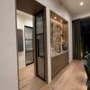 Hinged Pocket Door Black steel frame and fluted glass