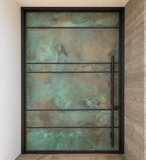large copper pivot door custom made
