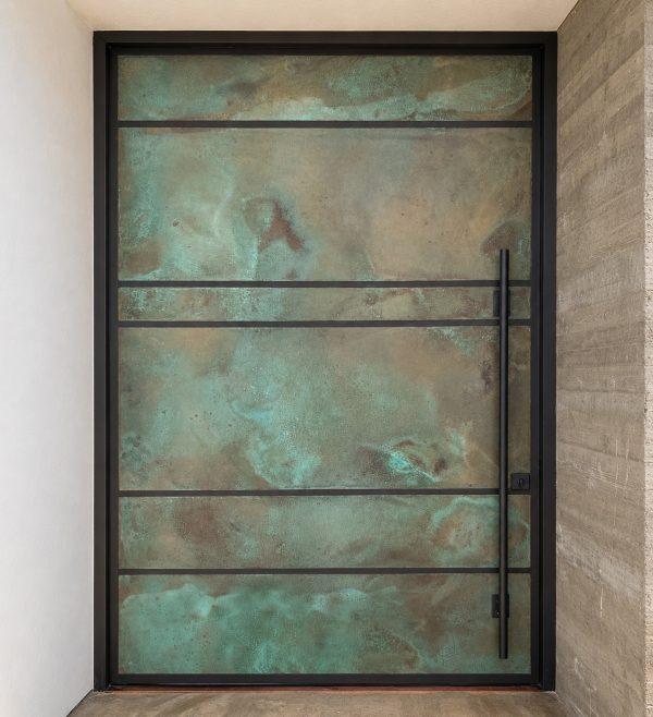 large copper pivot door custom made