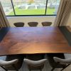 Overhead view of solid walnut live edge tabletop with blackened metal inlays in Scottsdale, Arizona