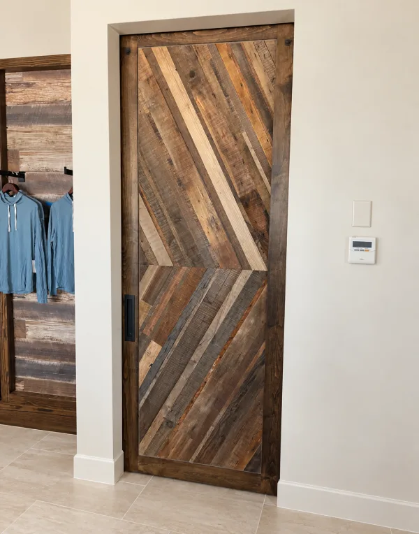 Reclaimed wood barn door in a chevron pattern