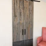 Double Reclaimed Wood Barn Doors with Metal Toe Kick