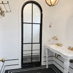 Arched Metal and Glass Shower Door