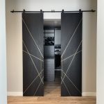 Blackened White Oak Barn Doors with Brass Inlays