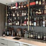 Brass and Glass Suspended Ceiling Mounted Shelves