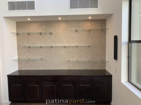 clear glass shelves with contemporary brackets