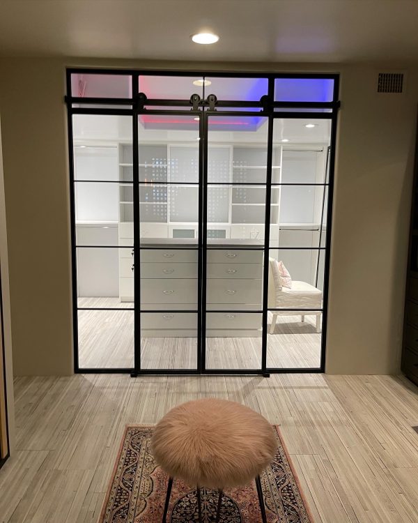 Closet Metal and Glass Barn Doors with Sidelights Black metal and glass sliding closet barn doors with sidelights and transoms