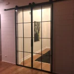 Contemporary Industrial Steel and Clear Glass Barn Doors