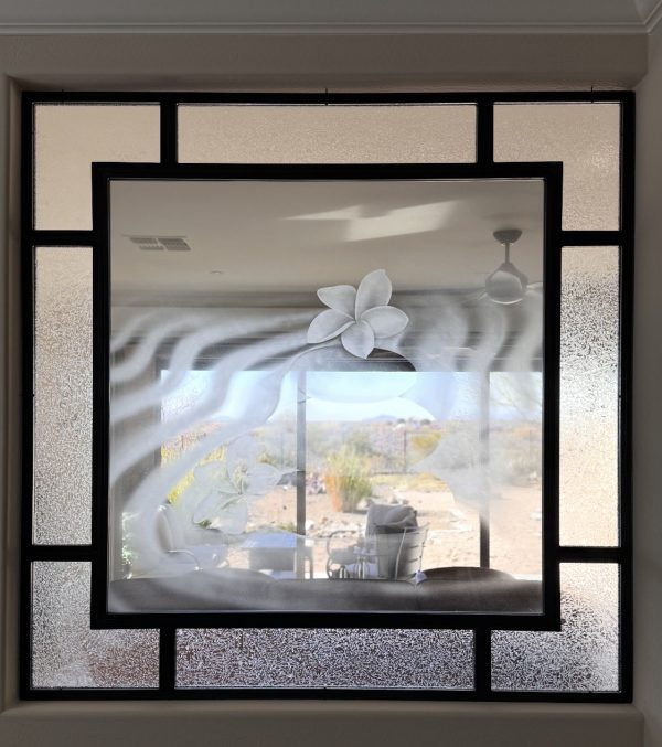 Etched Glass Interior Window Black metal interior window with etched specialty glass and a frosted glass border