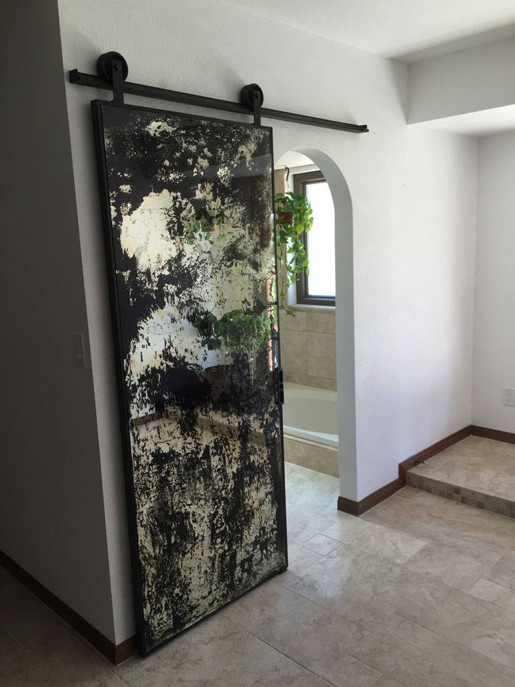 Black framed full length mirror sliding barn door