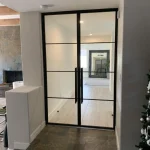 Metal and Clear Glass Hinged Double Doors