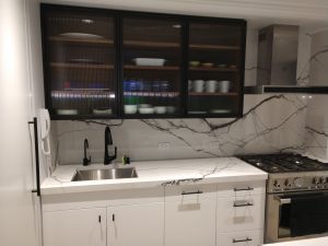 kitchen cabinet metal and reeded glass