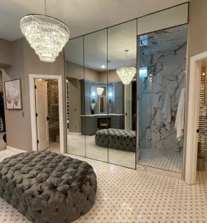 Mirror Walls with Metal Frame Mirror walls with metal frames in a dressing room
