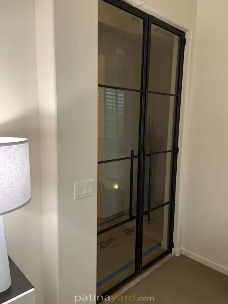 master bedroom contemporary metal and glass doors