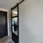 Single Industrial Contemporary Metal and Glass Barn Door