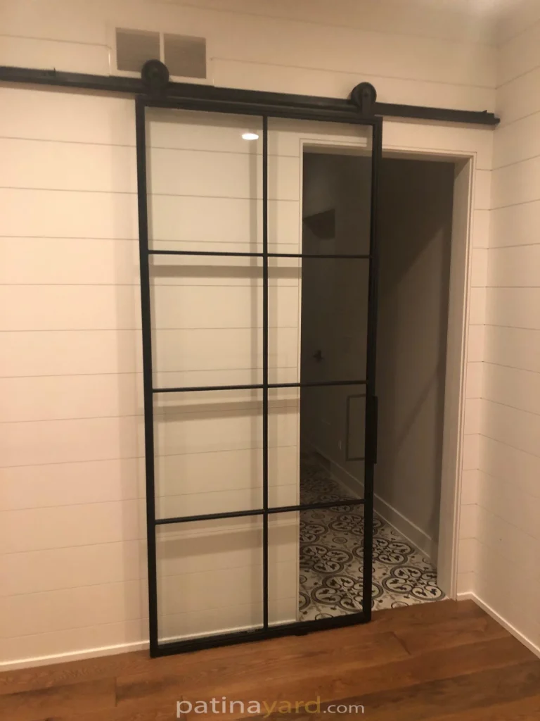 Metal and glass barn door