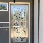 Stainless Steel and Glass Entry Door