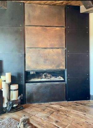 patinaed steel panels with brass metal
