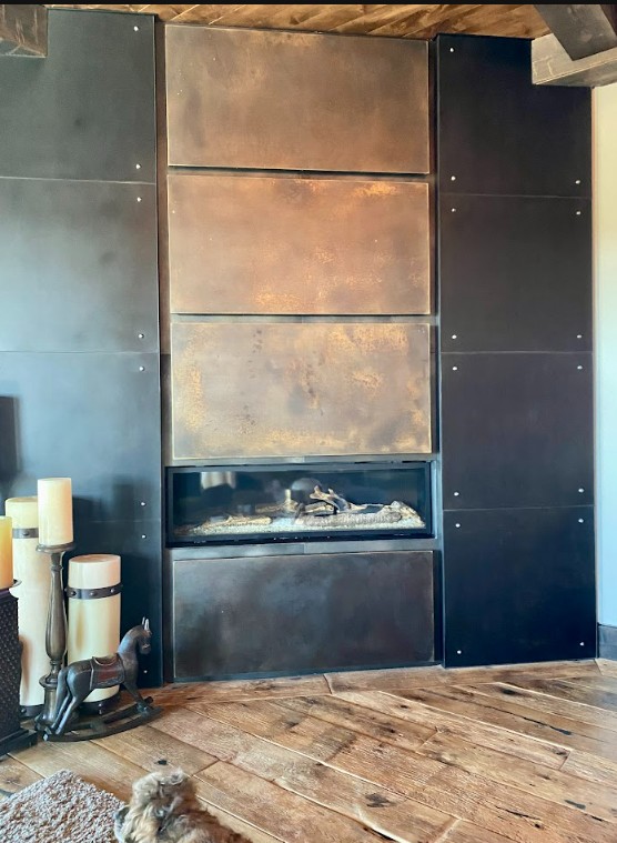 Steel and Brass Fireplace patinaed steel panels with brass metal