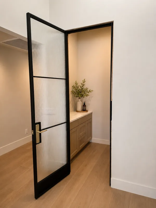 Steel and Reeded Glass Hinged Pantry Door Open black steel and reeded glass hinged pantry door