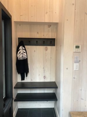 cantilevered steel shelves with metal hook rack