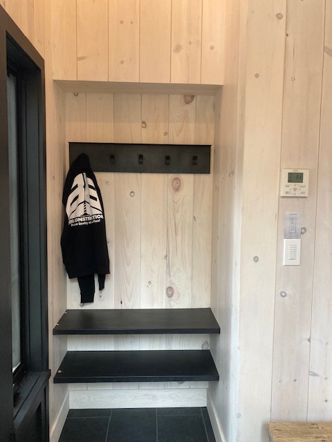 cantilevered steel shelves with metal hook rack