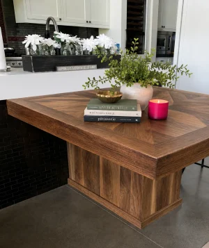 Walnut Starburst Kitchen Island Table Walnut kitchen island table with an inlaid starburst pattern top and walnut pedestal base