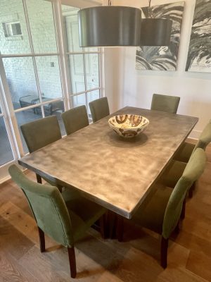 8 Person Zinc Dining Table Zinc top dining table for eight with green upholstered chairs